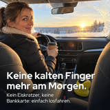 Beispielbild: Keine kalten Finger mehr am Morgen: am Steuer, mit Kaffee.