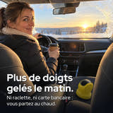 Photo d'illustration : Plus de doigts gelés le matin : au volant, un café à la main.